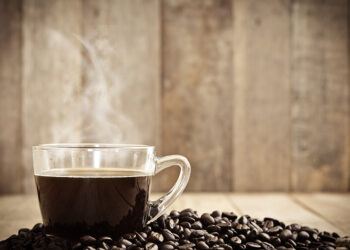 warm cup of coffee on vintage style